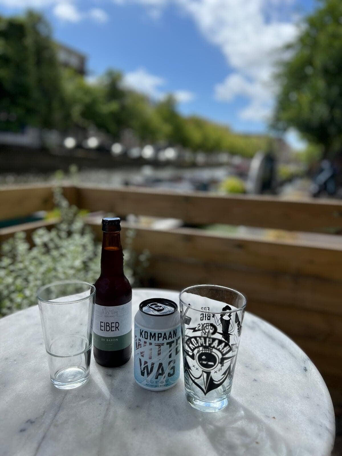 Kompaan beer on a table on our canal terrace