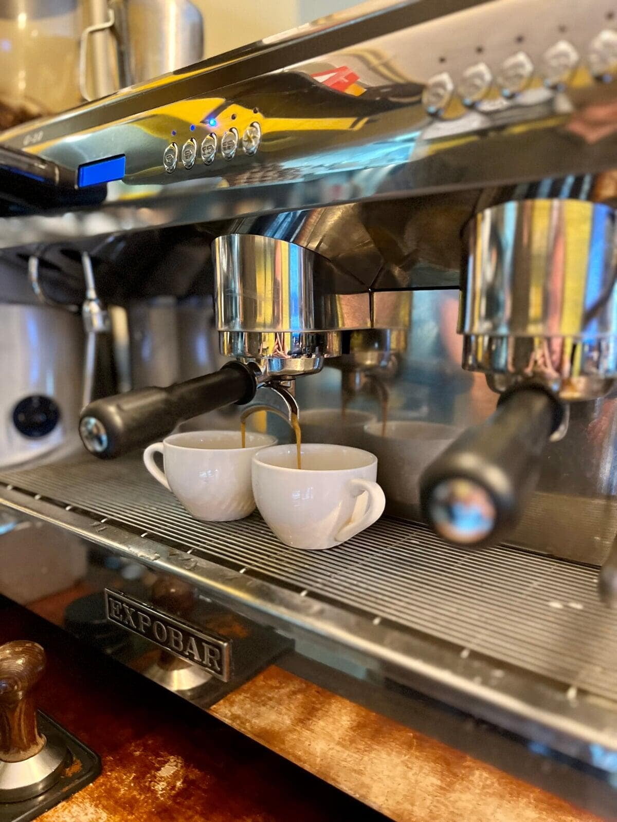 Two espressos being pulled at our bar